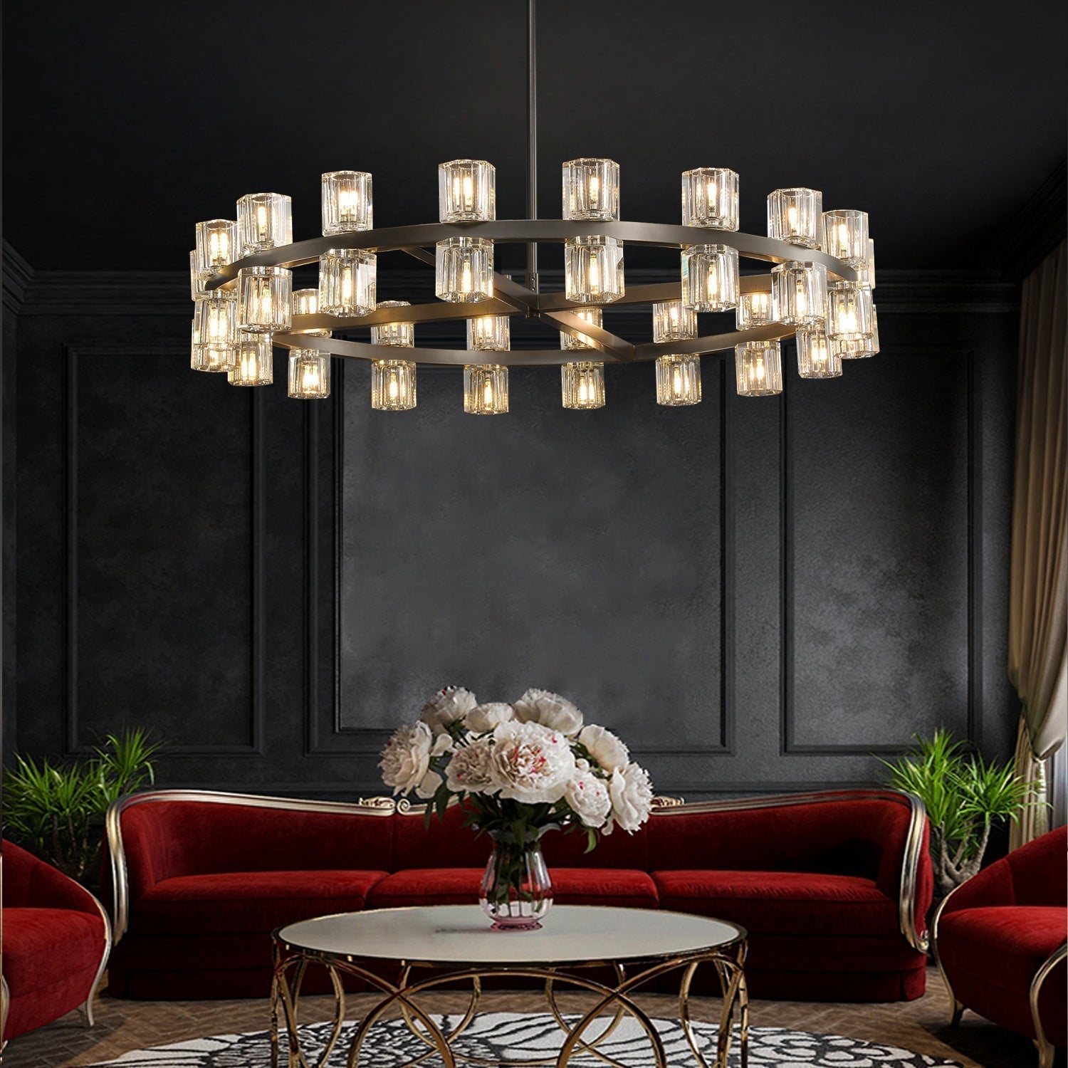 The rhythmic design of this chandelier collection is inspired by the shape and scale of industrial gears, where spokes are interlaced with negative space to interlock with other gears. Here, the spokes are hexagonal in form, juxtaposed with a circular interior, crafted from crystal glass, running along a simple, sturdy metal frame. The light shines through the glass as if it were a candle.