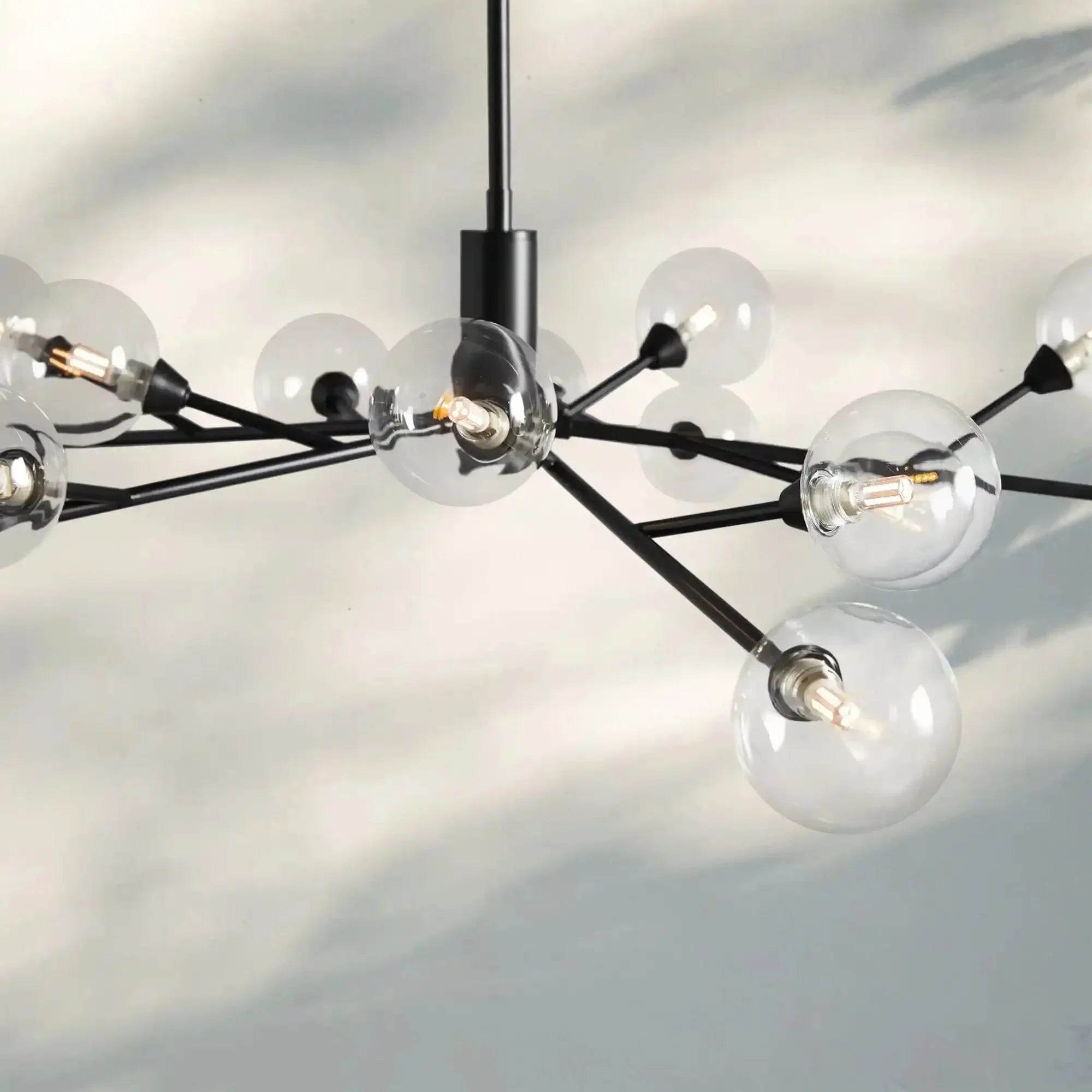 Apollo Round Midcentury Modern Starburst Chandelier in Antiqued Finishes